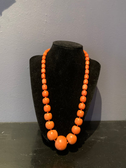 A coral bead necklace