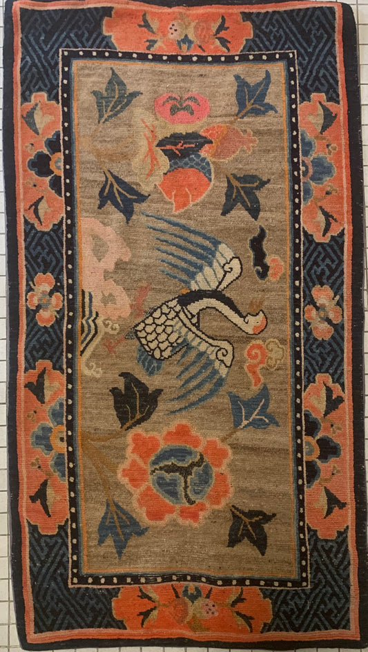 An antique Tibetan rug