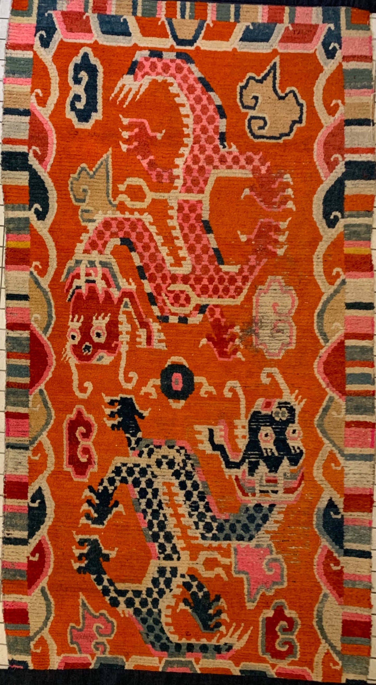 A 19th C., unique antique Tibetan dragon rug