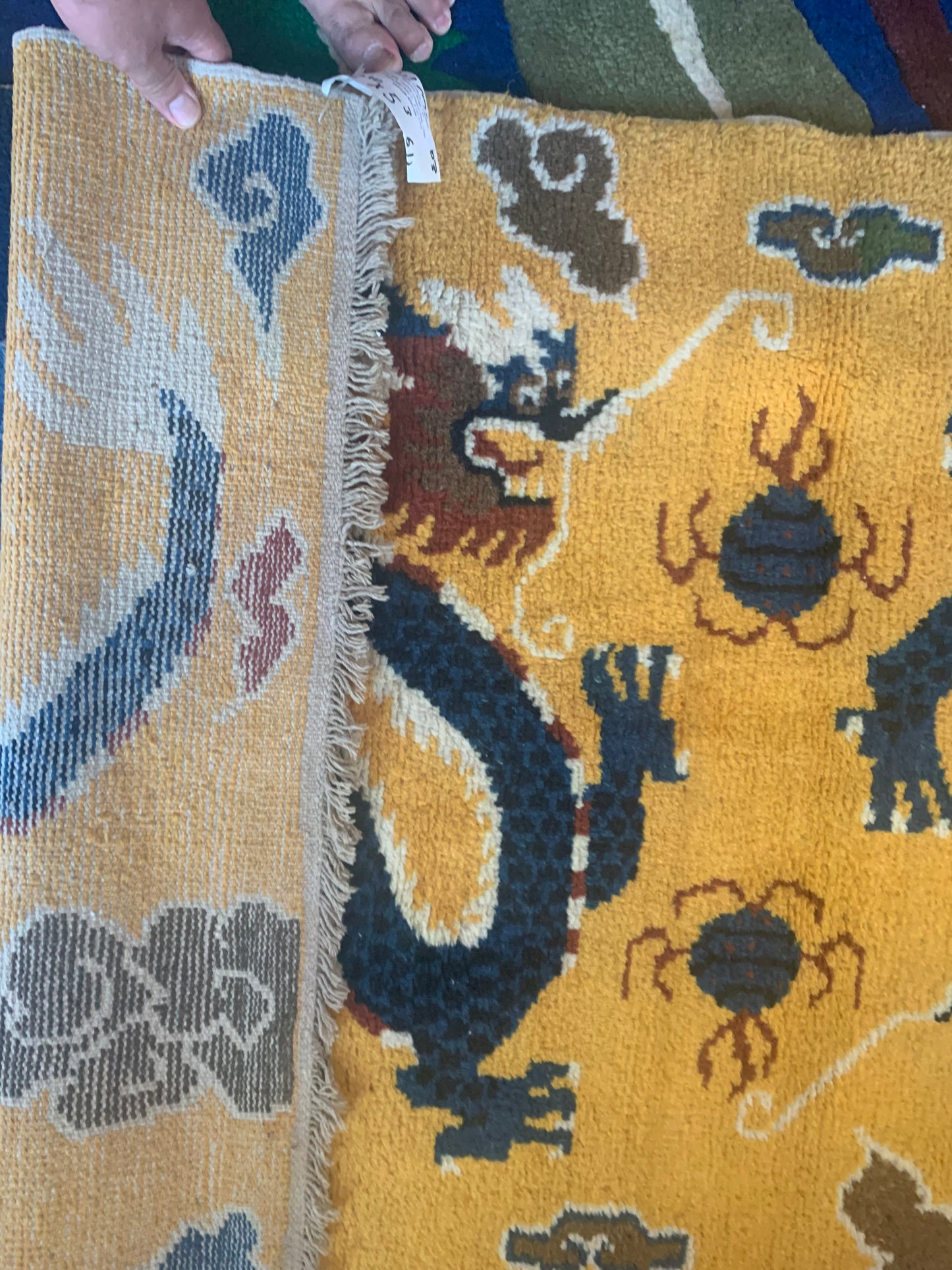 A vintage Tibetan dragon carpet