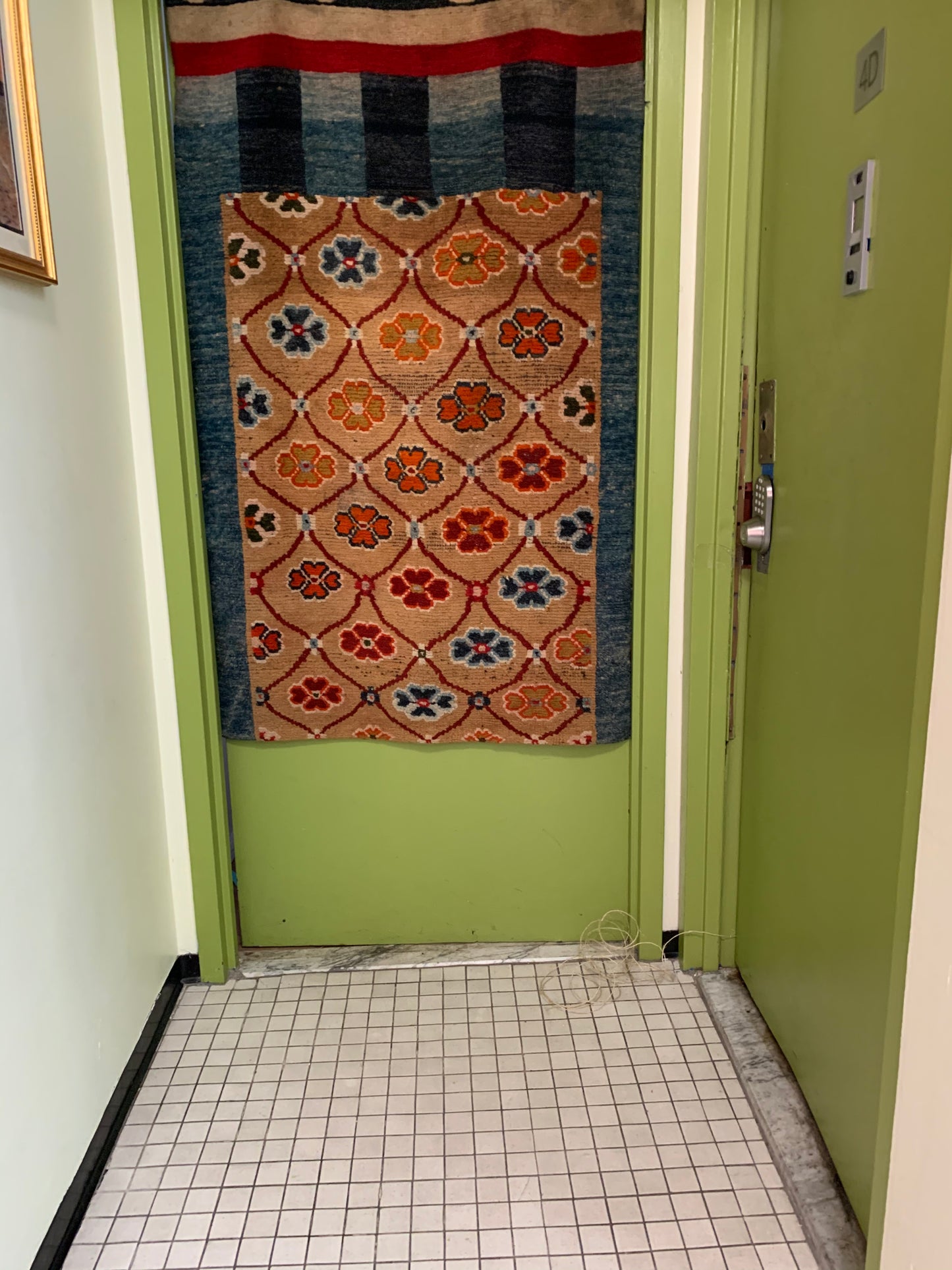 An antique Tibetan door curtain rug