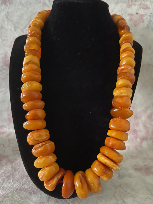 A vintage butterscotch amber bead necklace