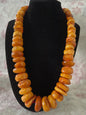 A vintage butterscotch amber bead necklace