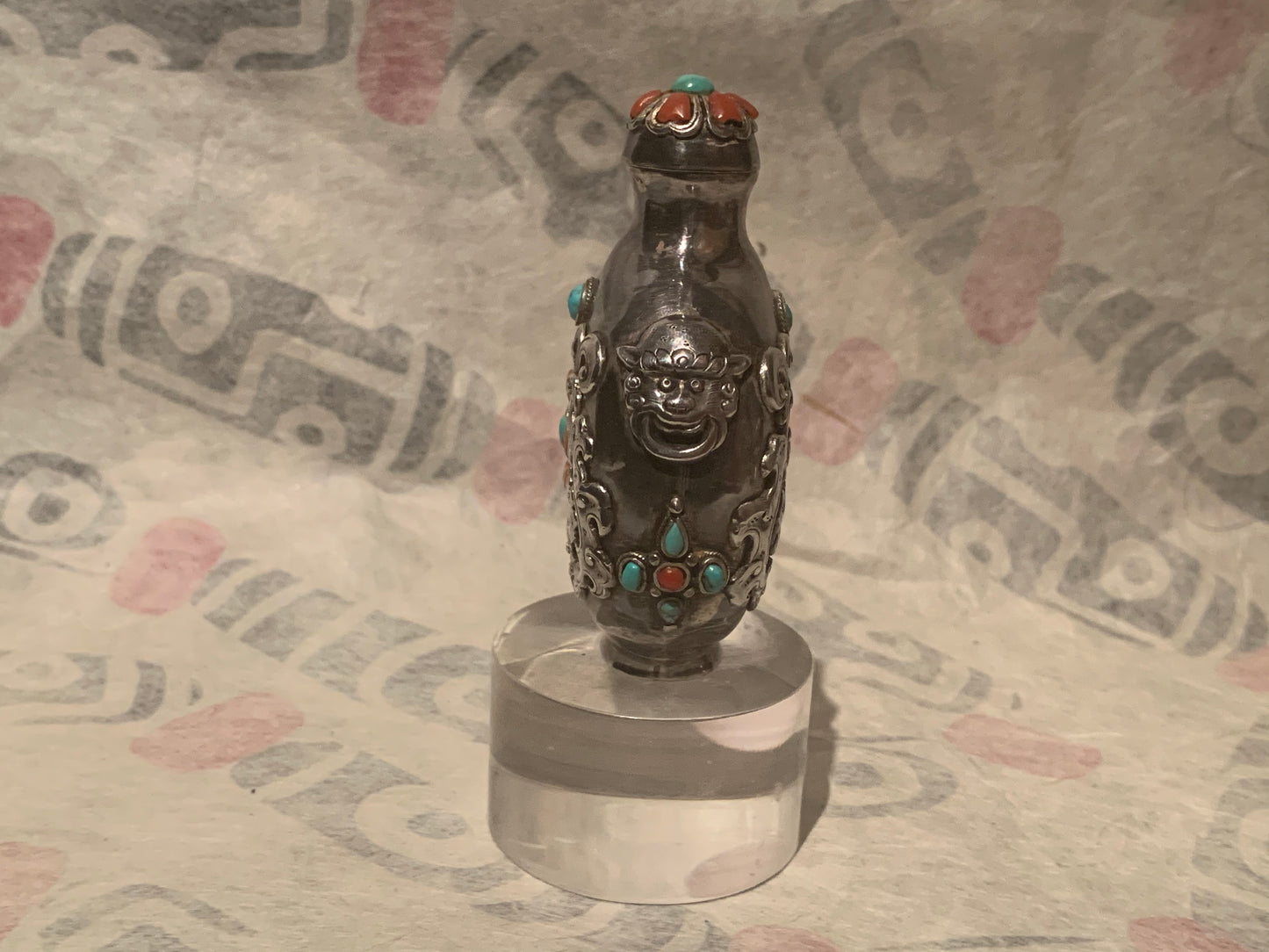 A Mongolian silver snuff bottle - with coral and turquoise