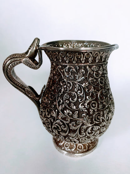 A silver creamer
