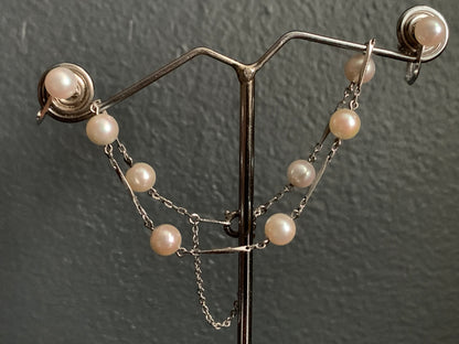 A Pearl and silver ear rings and bracelet