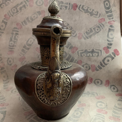 An antique Tibetan bronze teapot