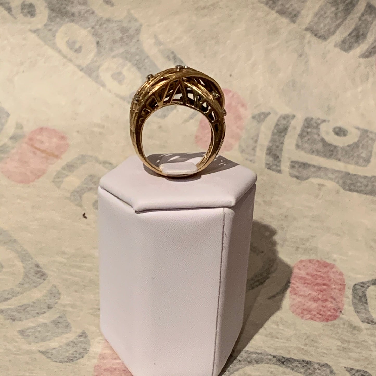 An 18k gold and diamond ring