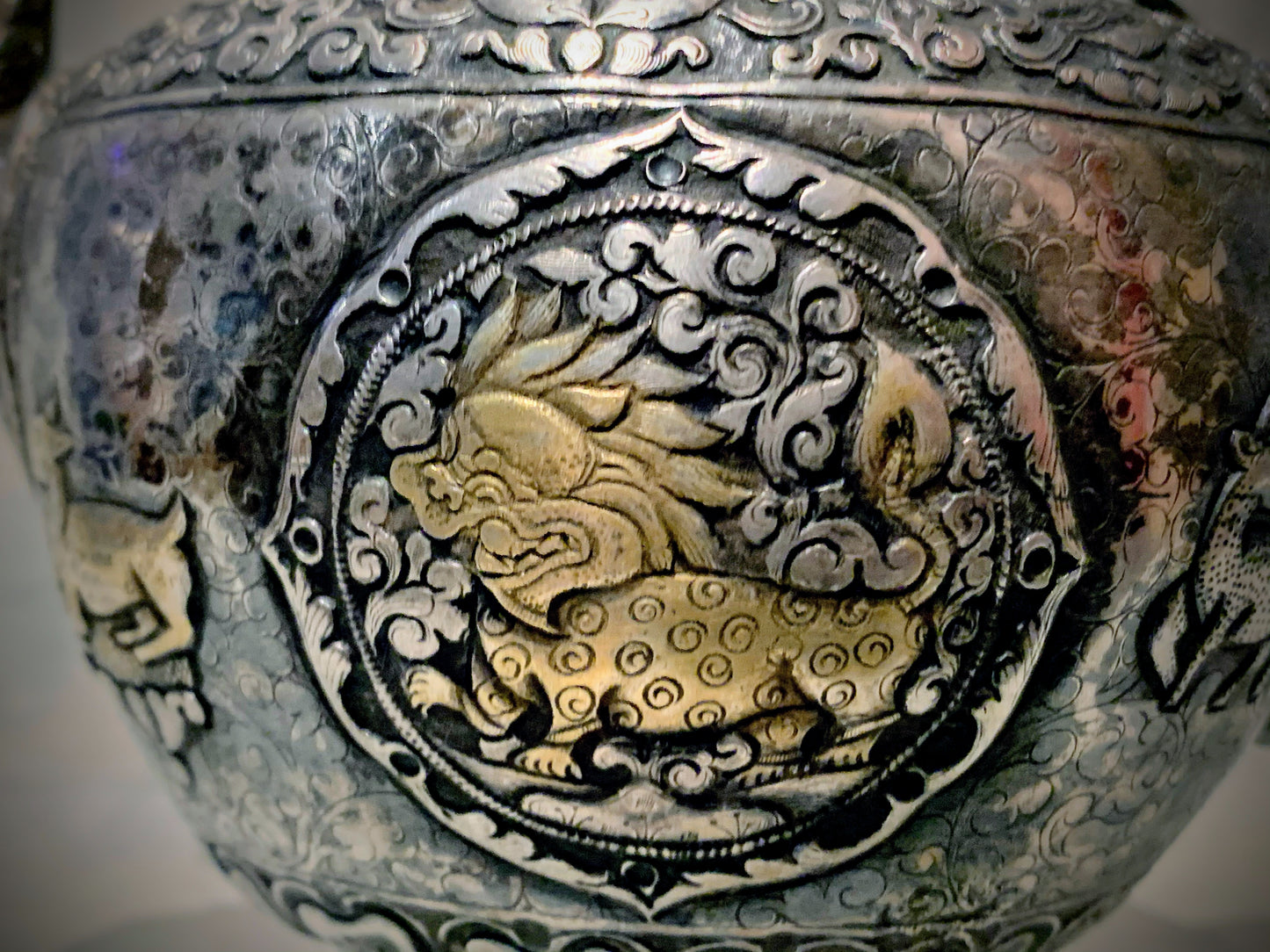 An antique silver and gilt ceremonial Tibetan teapot