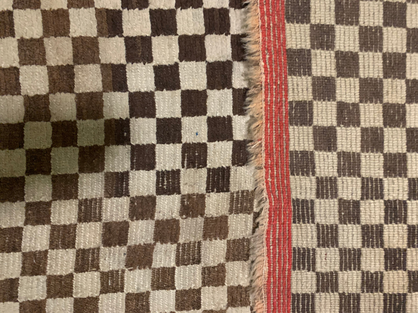 An antique Tibetan checkerboard rug