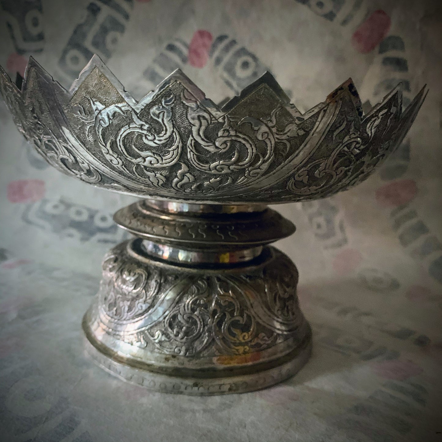 An antique silver fruit bowl stand