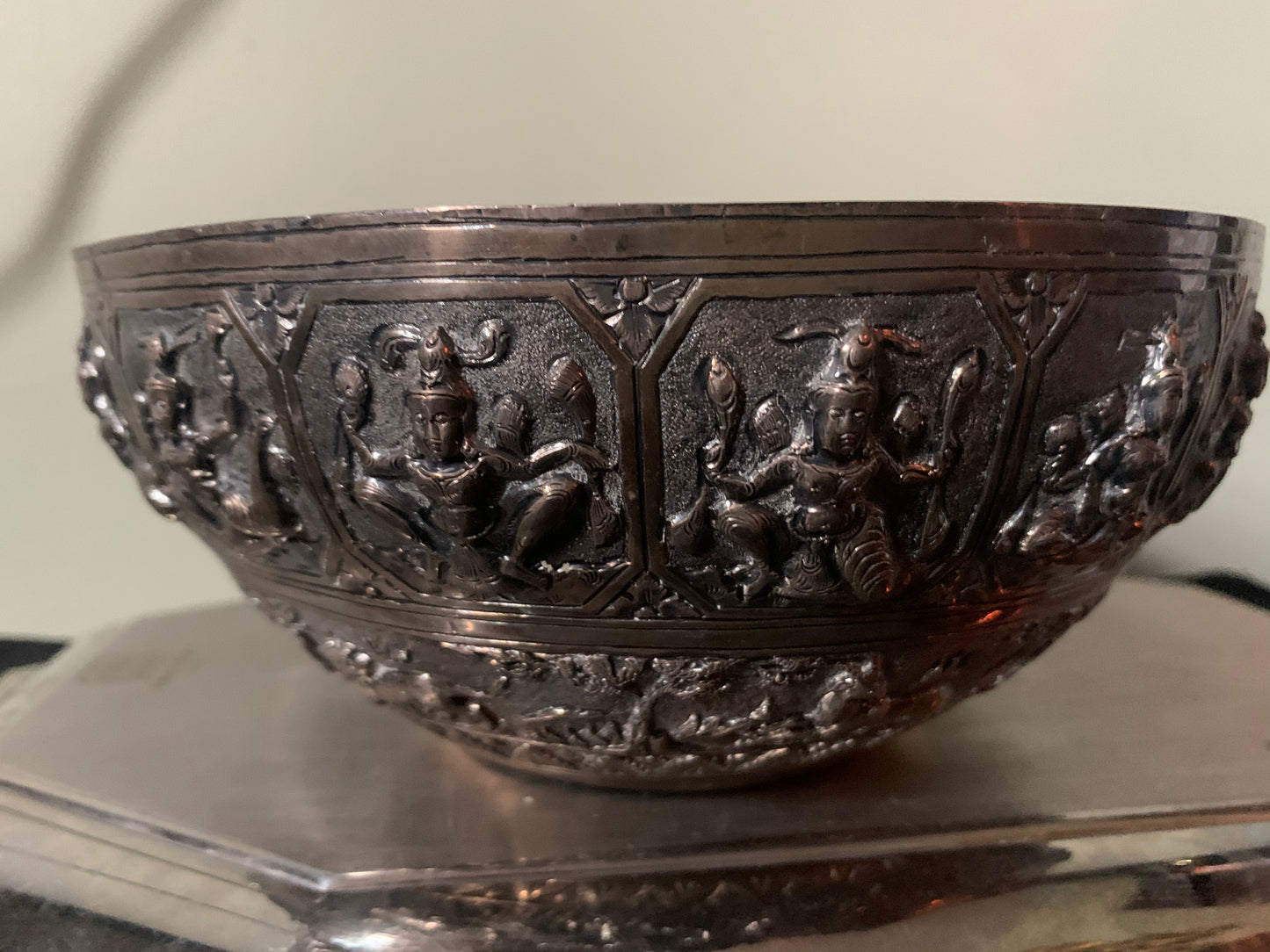 A silver repousse bowl