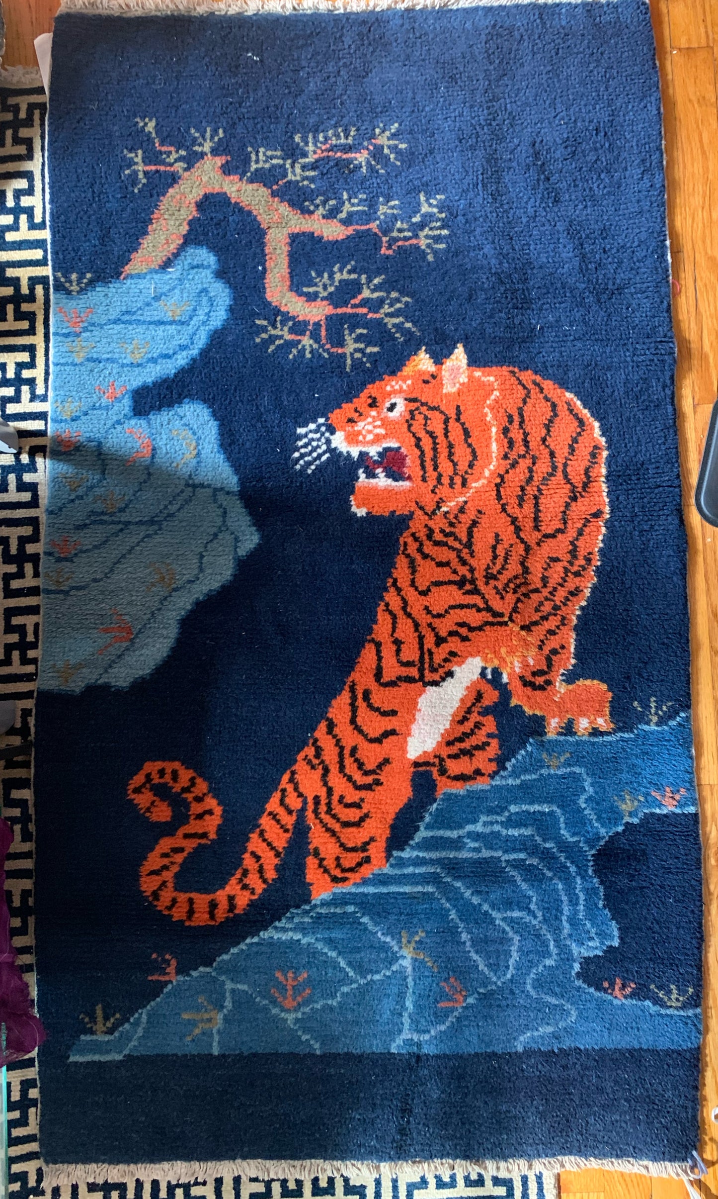 A vintage Tibetan Tiger carpet