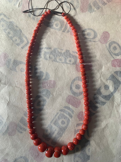 A necklace with antique coral beads