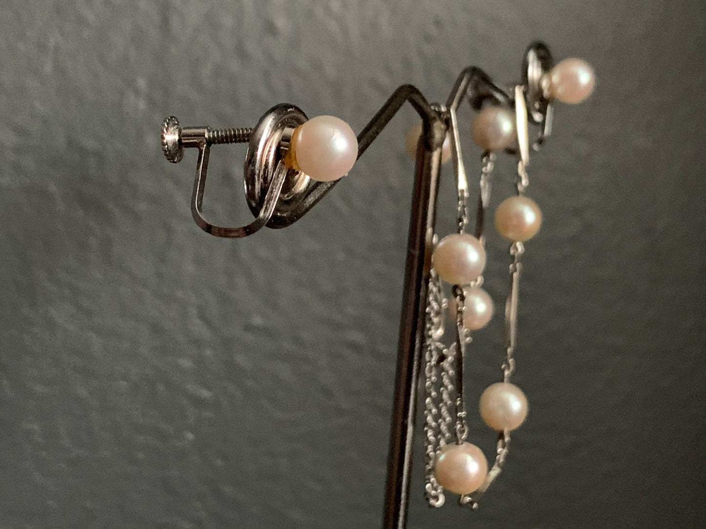 A Pearl and silver ear rings and bracelet