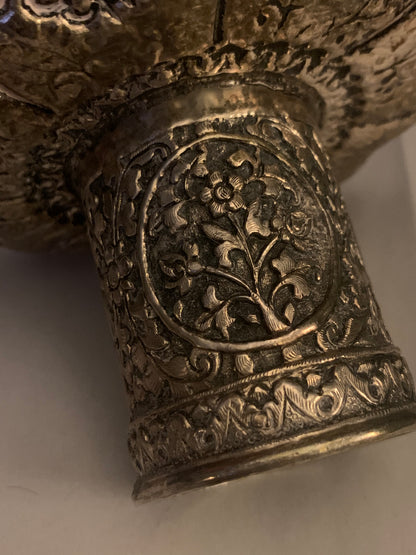 A silver Tibetan cup stand
