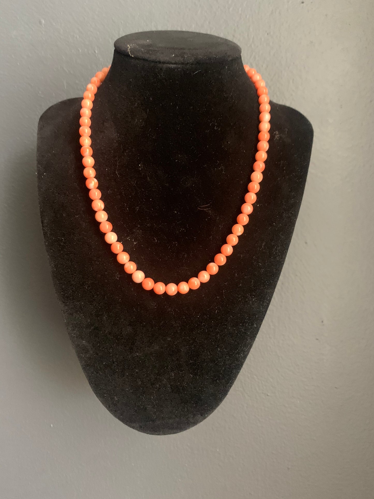 A salmon color coral necklace
