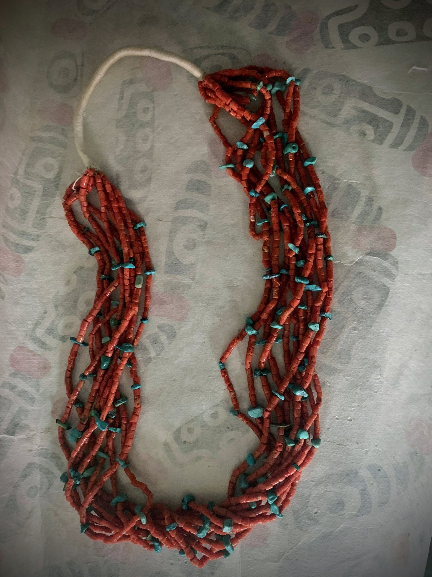 A vintage Native American coral and turquoise necklace