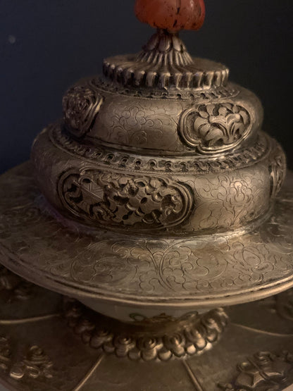 A silver Tibetan cup stand