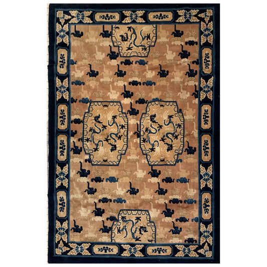 An antique ningxia dragon rug