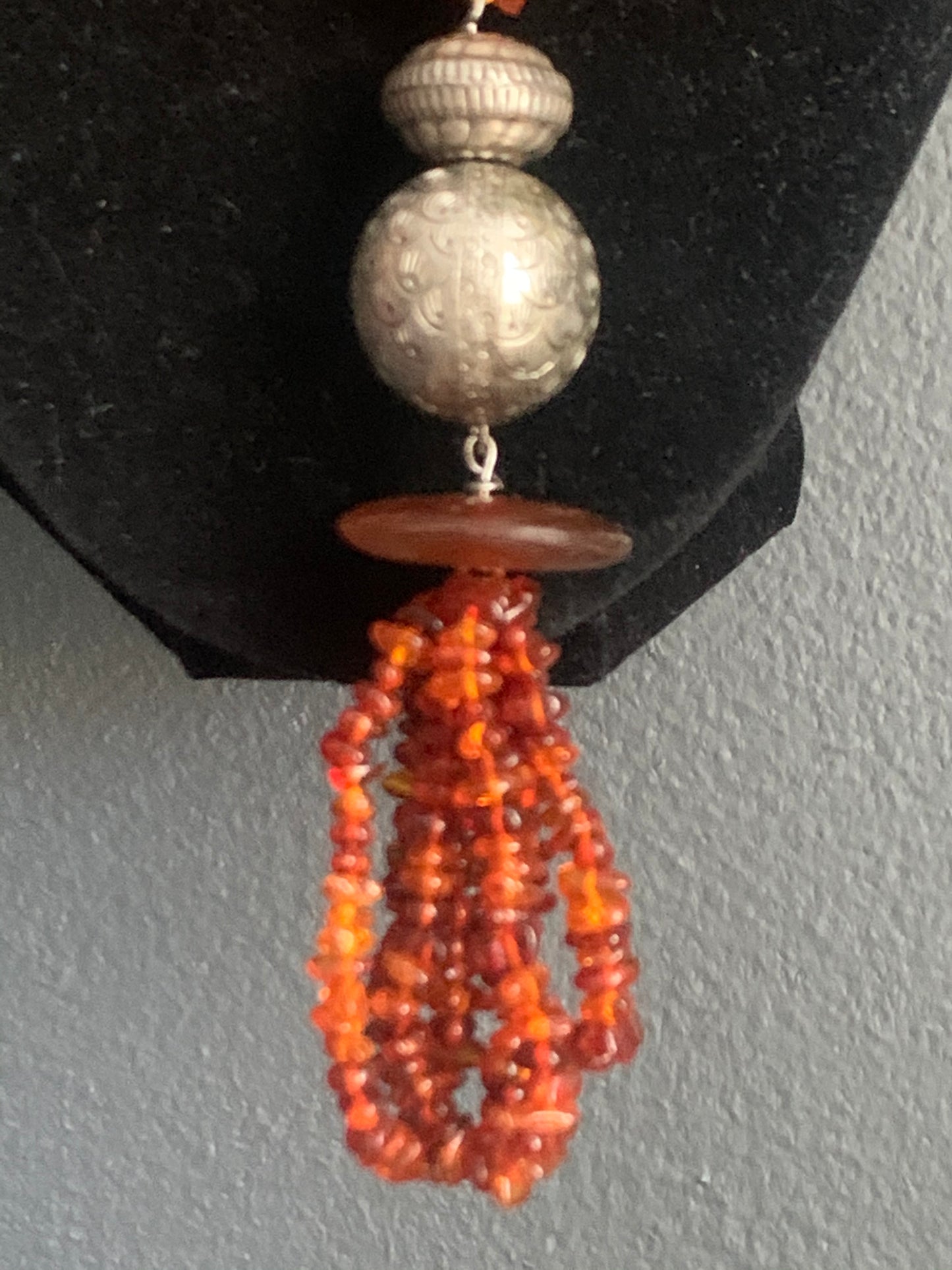 An amber and silver necklace