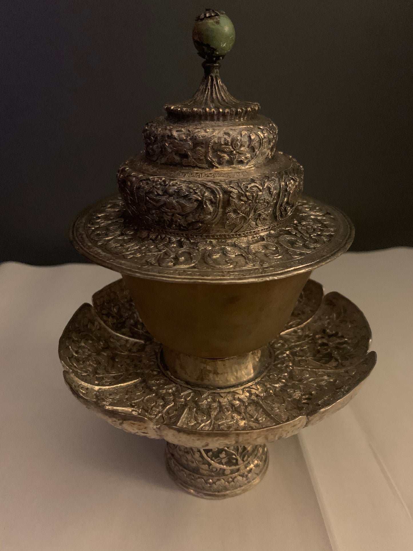 A silver Tibetan cup stand