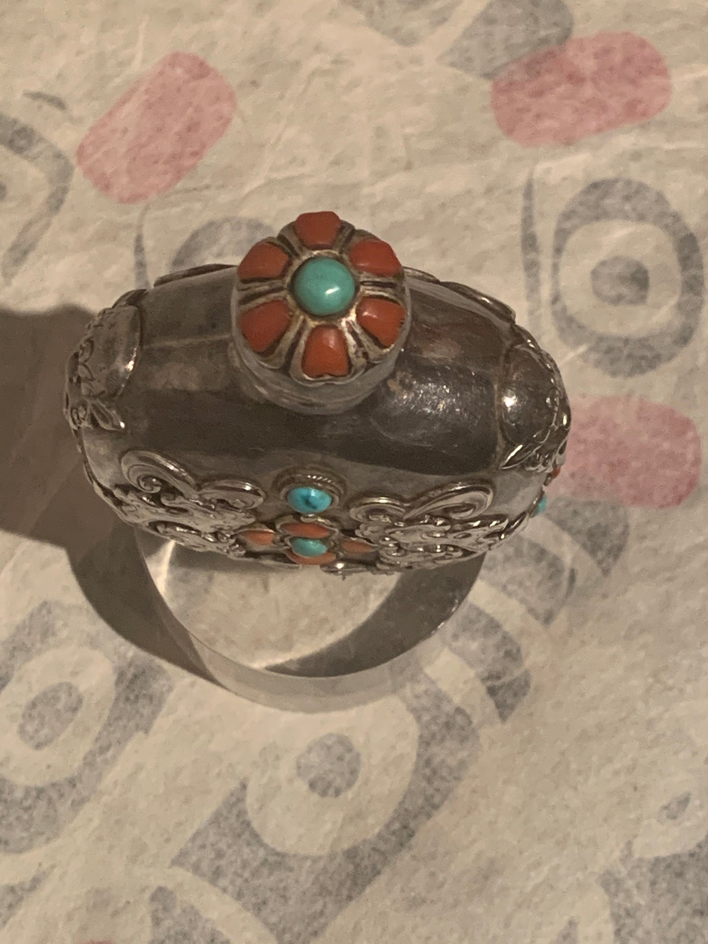 A Mongolian silver snuff bottle - with coral and turquoise