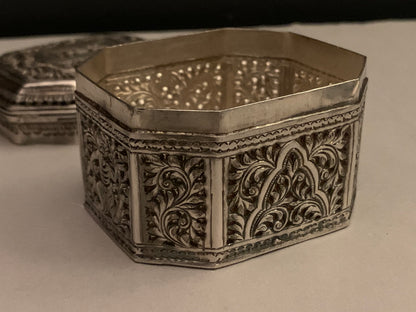 An octagonal silver box