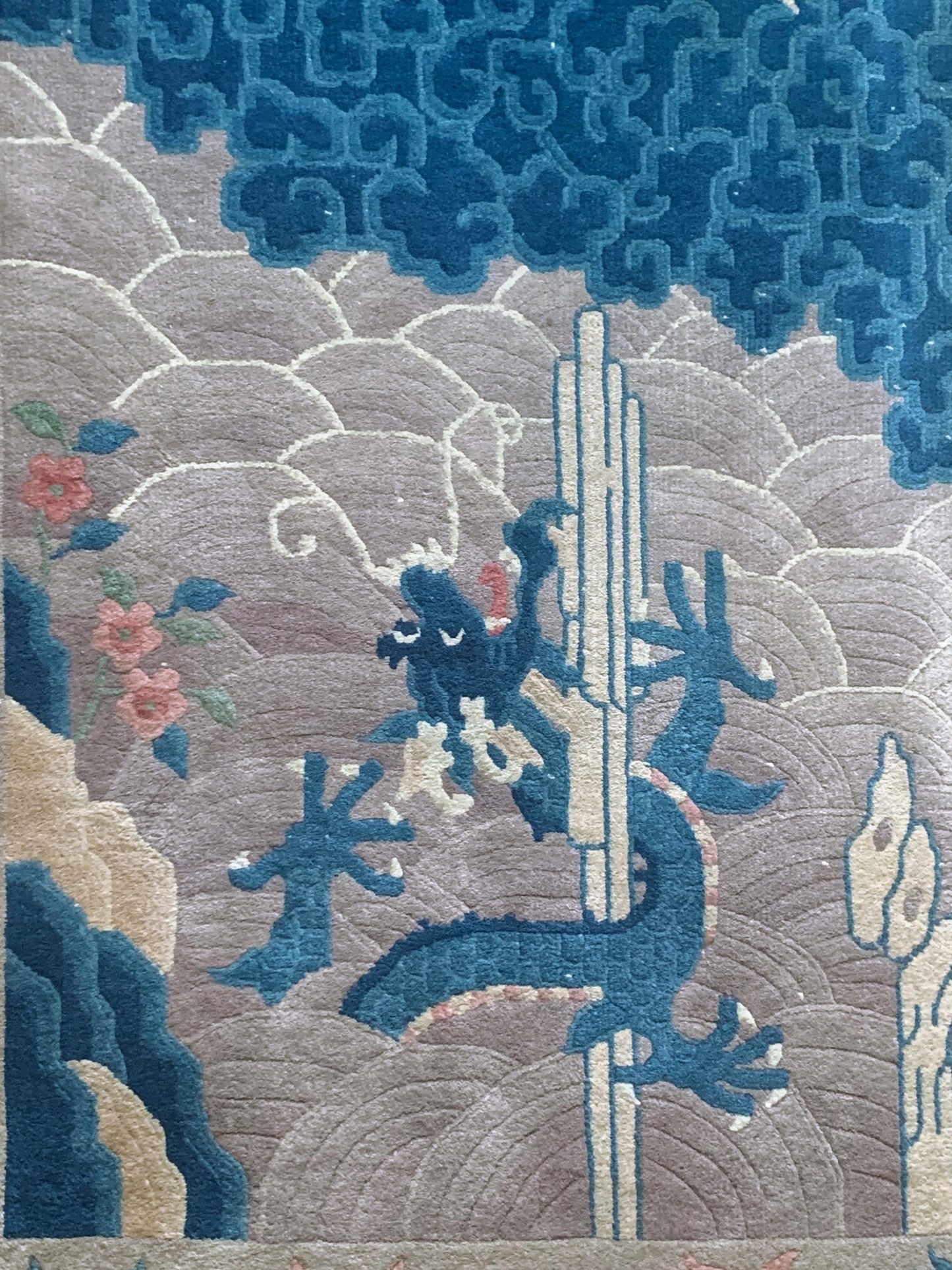 An antique Chinese dragon rug