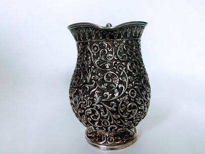 A silver creamer
