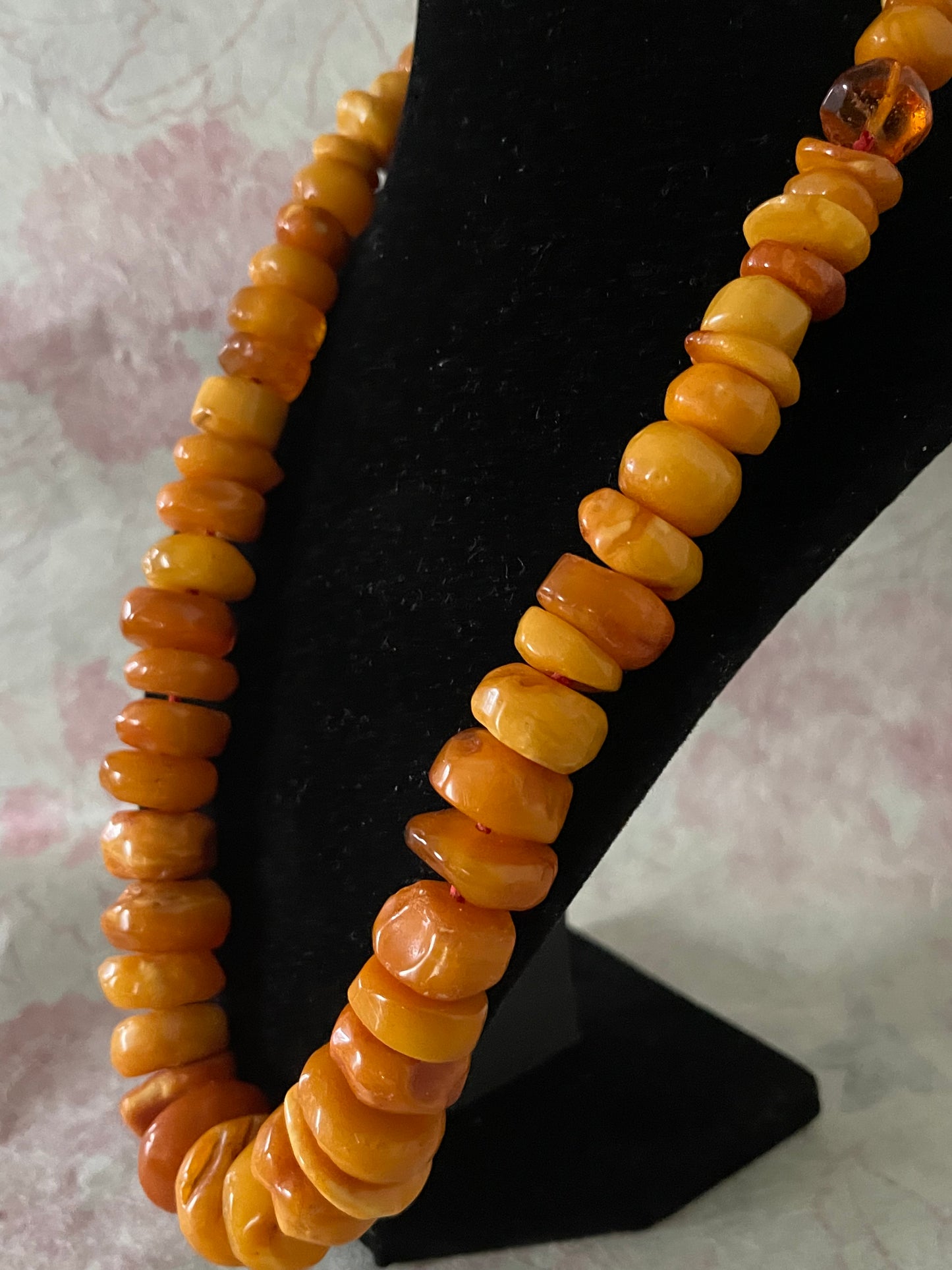 A vintage butterscotch amber bead necklace