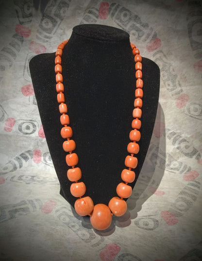 A coral bead necklace
