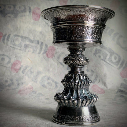 A silver Tibetan butterlamp