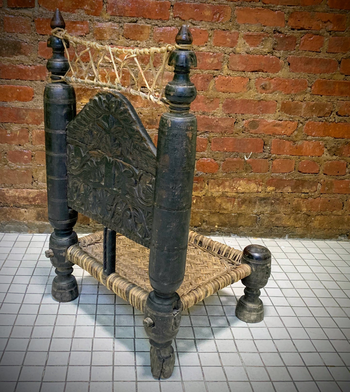 Low antique Indian chair