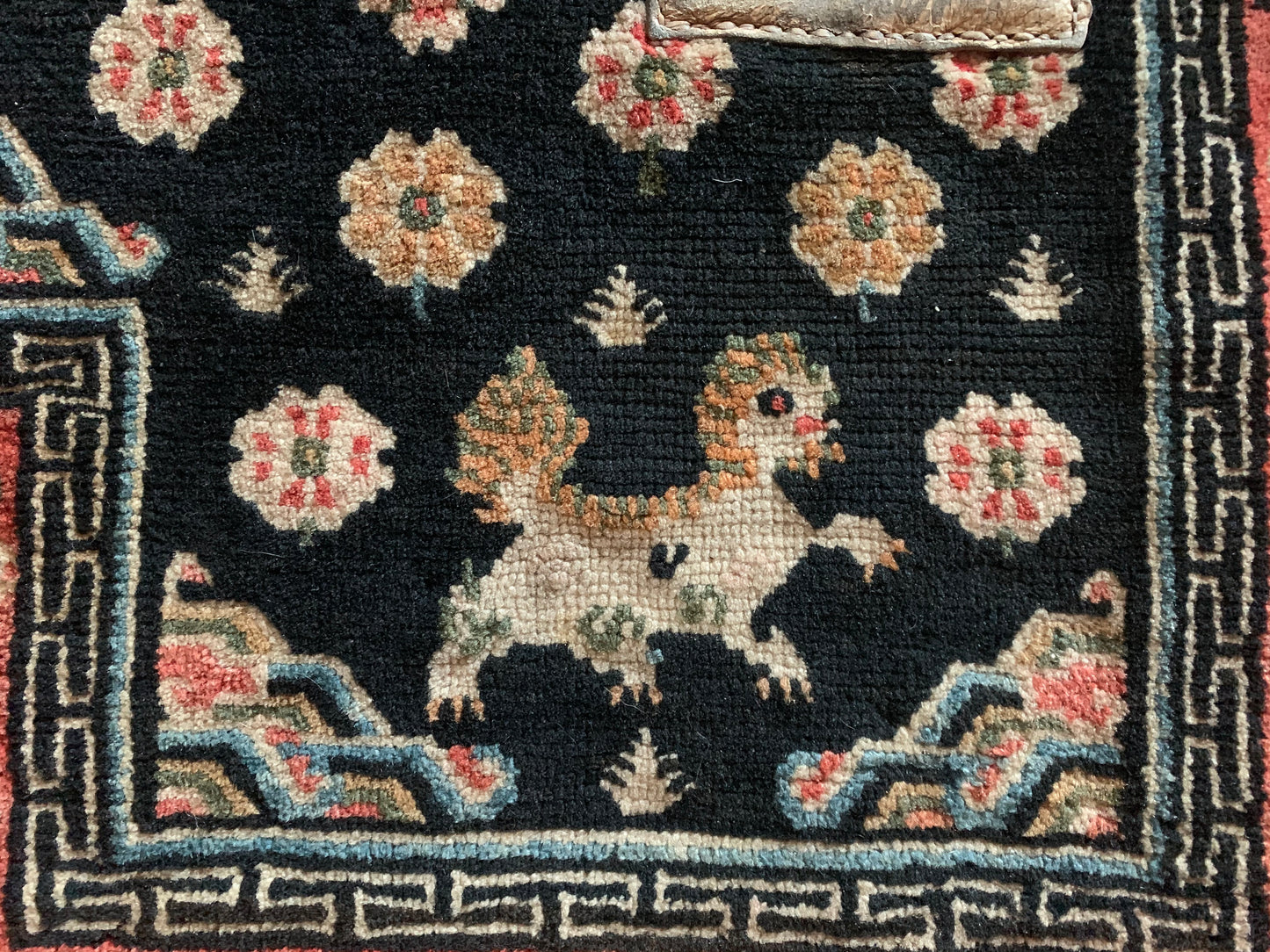 An antique Tibetan horse blanket carpet and saddle topper