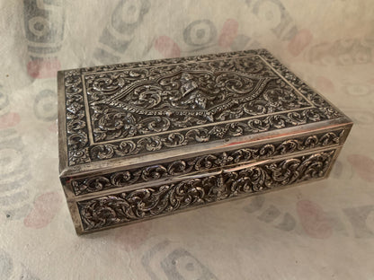 An antique cylindrical Thai silver box
