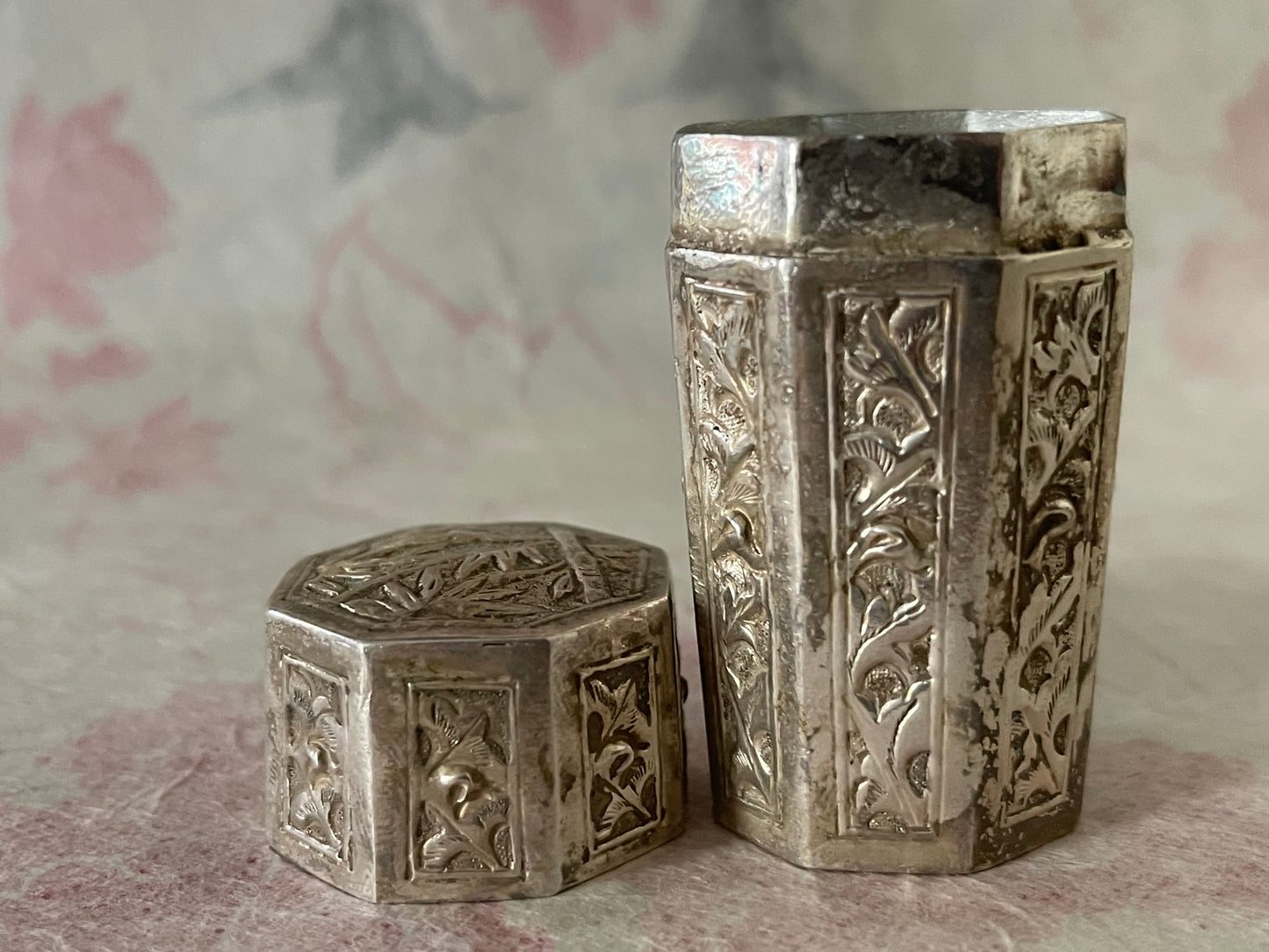 An antique octagonal shaped silver box with lid from south east Asia.