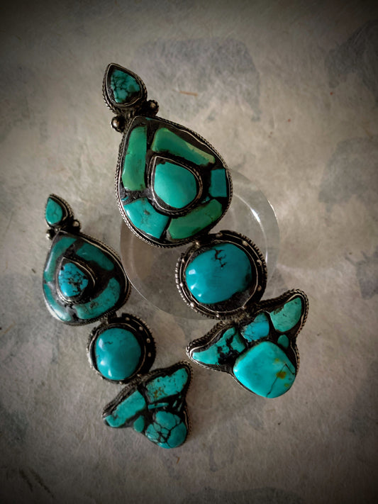 A pair of antique Tibetan turquoise and silver ear pendants / earrings