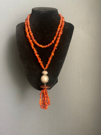 An amber and silver necklace