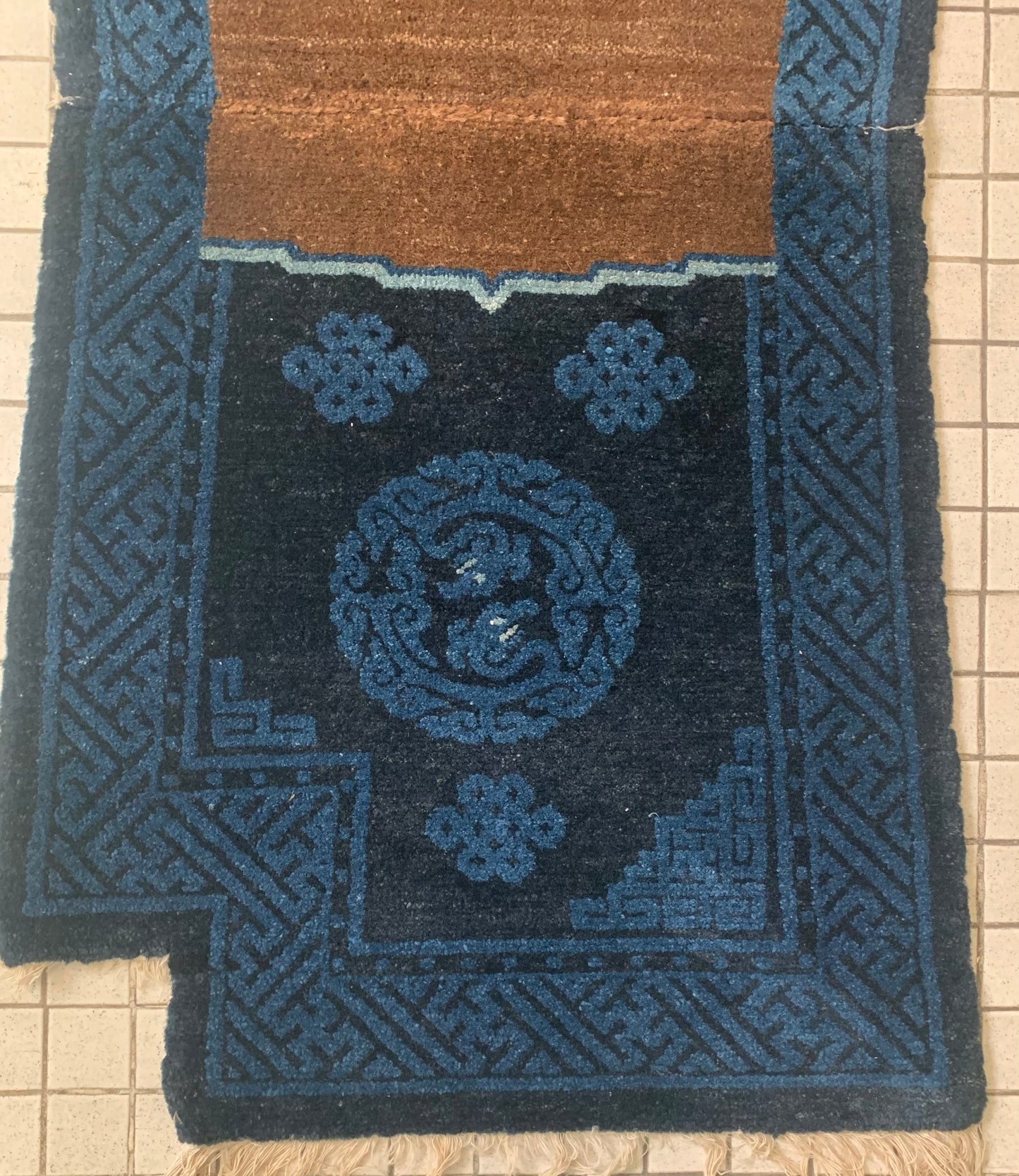 A vintage indigo saddle rug