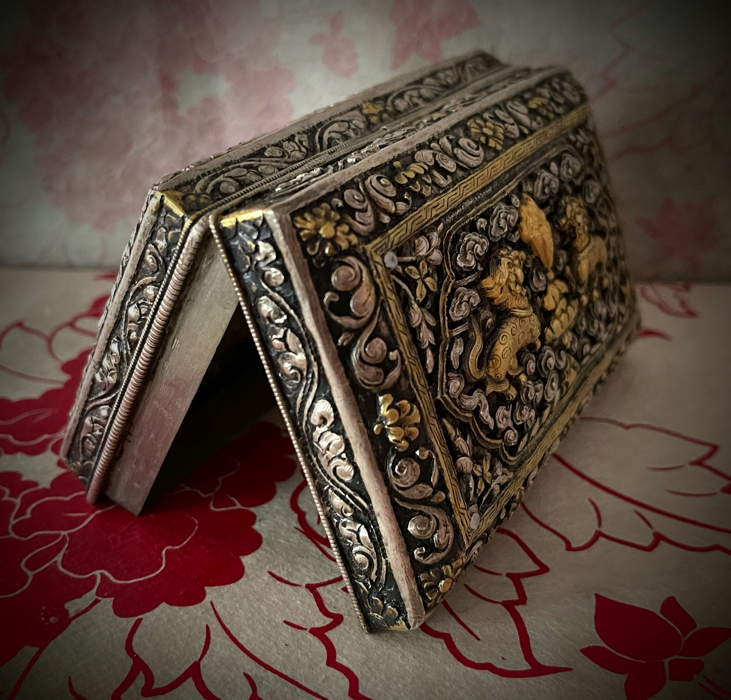 An antique carved  Silver and gilded silver Bhutanese betel nut box