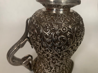 A silver creamer