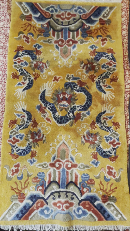 A mid-late 20th C. Dragon rug