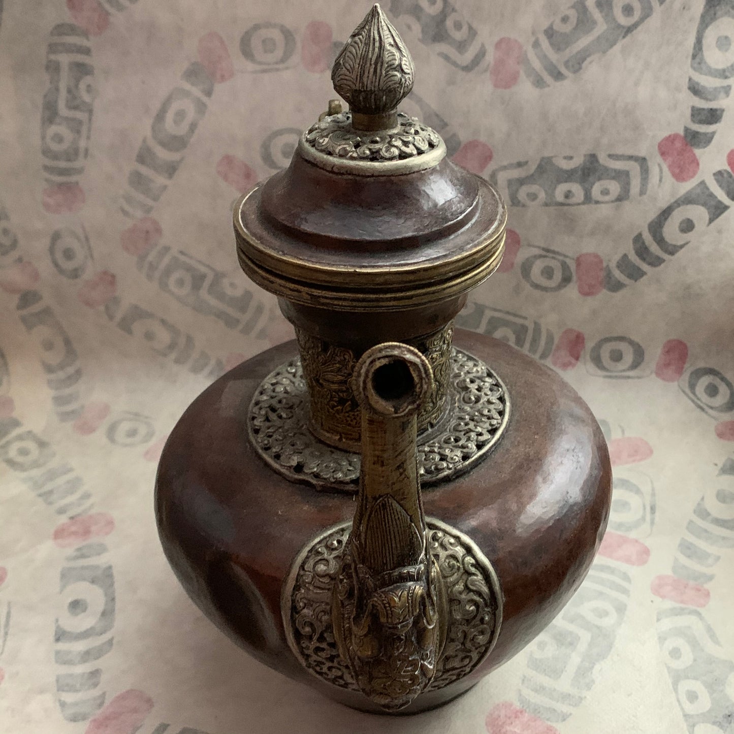 An antique Tibetan bronze teapot