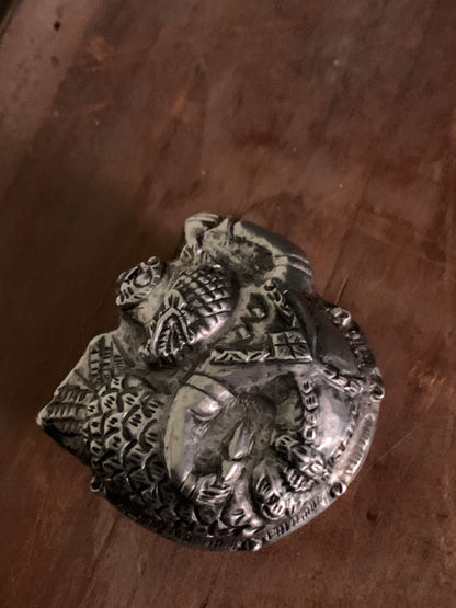 A silver pill box