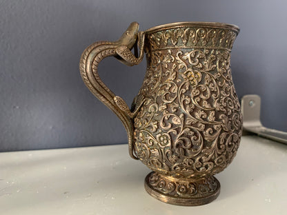 A silver creamer