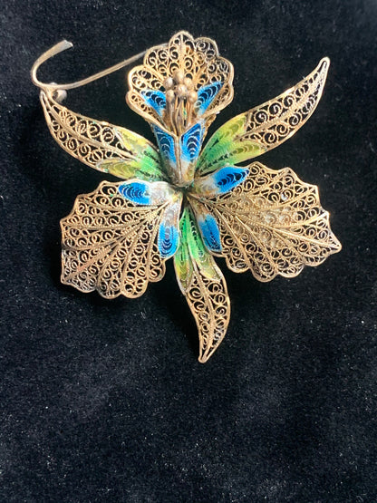 A filigree/ enamel Florence-orchid brooch