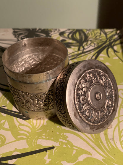 A cylindrical metal box