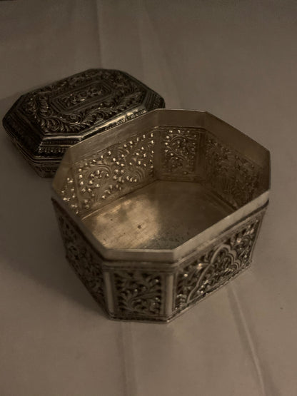 An octagonal silver box