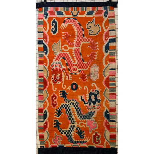 A 19th C., unique antique Tibetan dragon rug